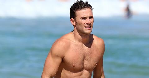 EXCLUSIVE: Scott Eastwood shows off his muscles at Bondi Beach