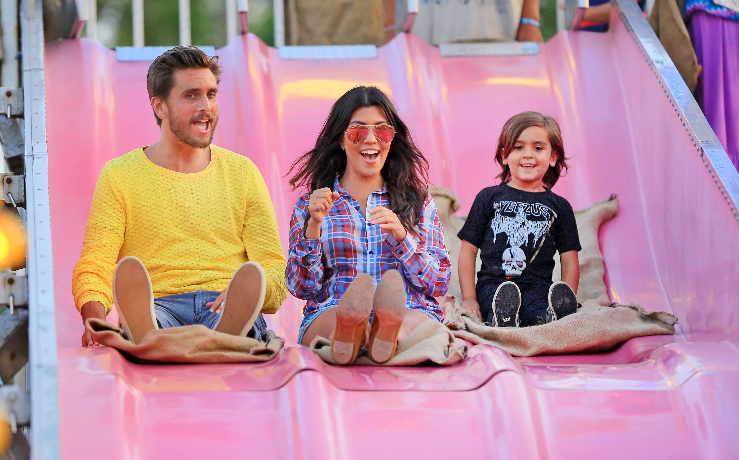 Scott Disick and Kourtney Kardashian take Mason to a street fair in the Hamptons, NY with Kim Kardashian, Kendall Jenner and Hailey Baldwin