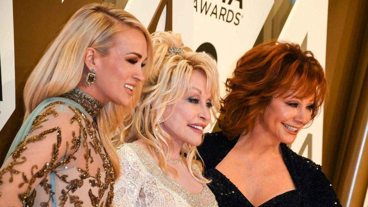 Photo of Carrie Underwood, Dolly Parton and Reba McEntire.