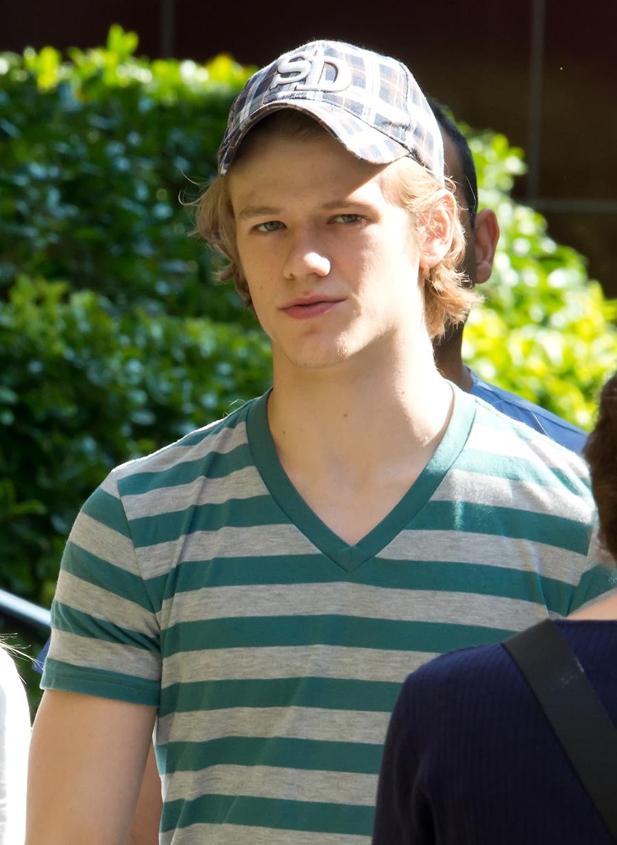 Lucas Till and a female friend eat lunch at Parc Restaurant Bistro and Cafe in Philadelphia, PA