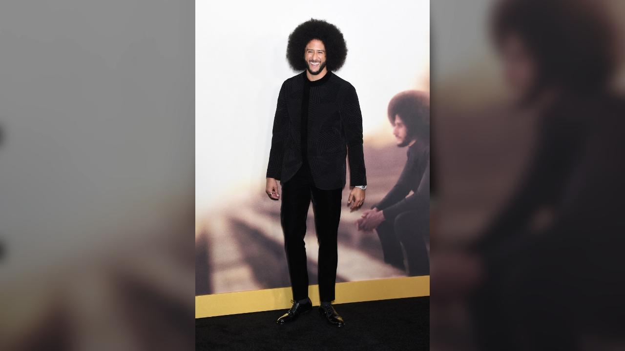 Colin Kaepernick on red carpet.