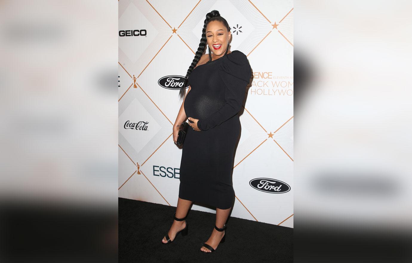 Tia Mowry Wearing Black Dress