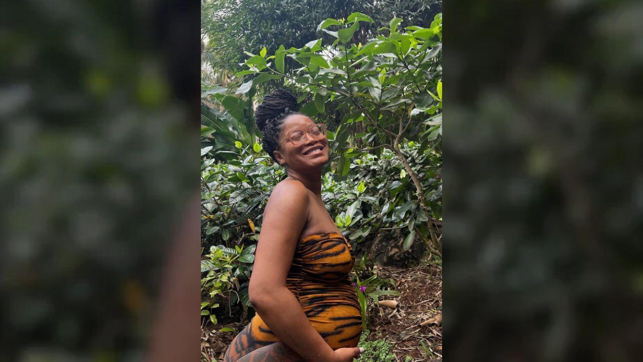 Image of Keke wanting to conceal her pregnancy.