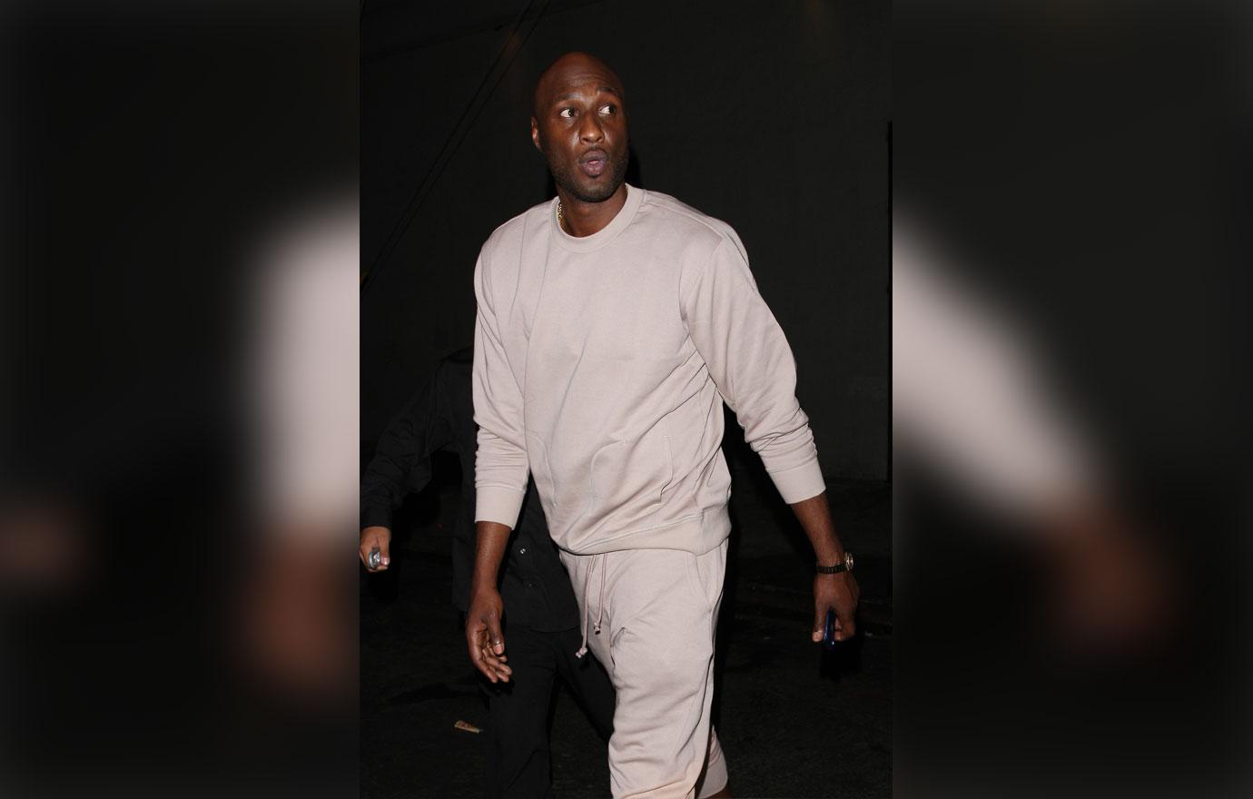 Lamar Odom leaves the Argyle club with a female companion after enjoying the evening till 2:30 A.M. in the morning