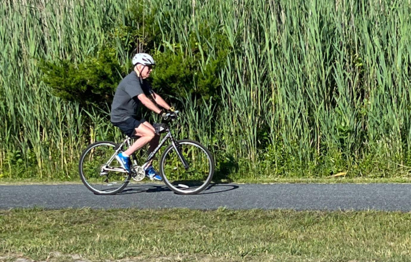 joe biden tumbles off his bicycle while on delaware outing with jill