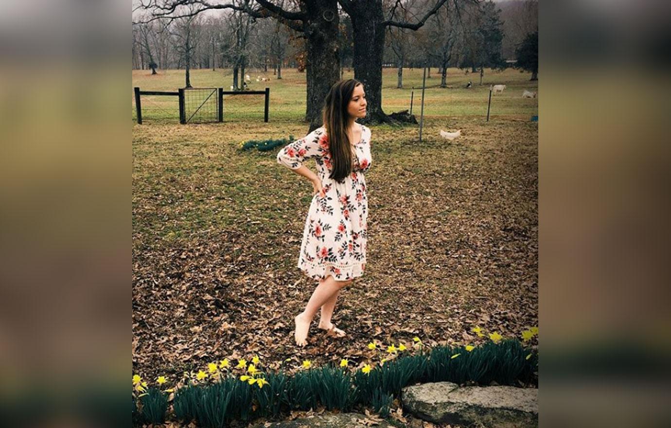 Joy-Anna Duggar posing by a lake