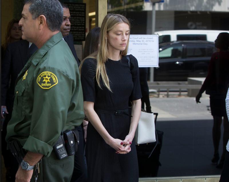 Amber Heard leaves court in LA after claiming Johnny Depp physically assaulted her