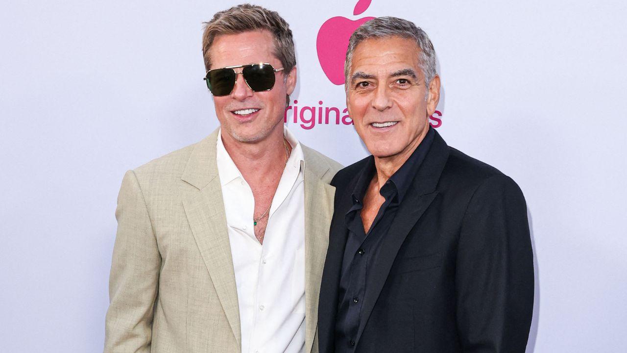 Image of Brad Pitt couldn't resist poking fun at George Clooney's dance moves while celebrating his longtime friend's career.