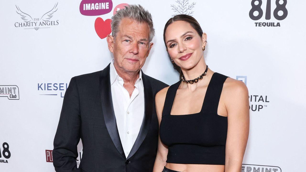 Image of David Foster and Katharine McPhee posed for photos with Meghan Markle and Prince Harry.