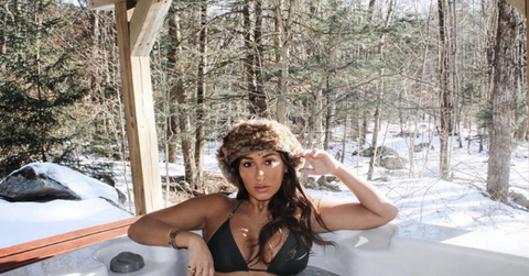 Adrienne Bailon Shows Off Her Figure In Bikini Photoshoot