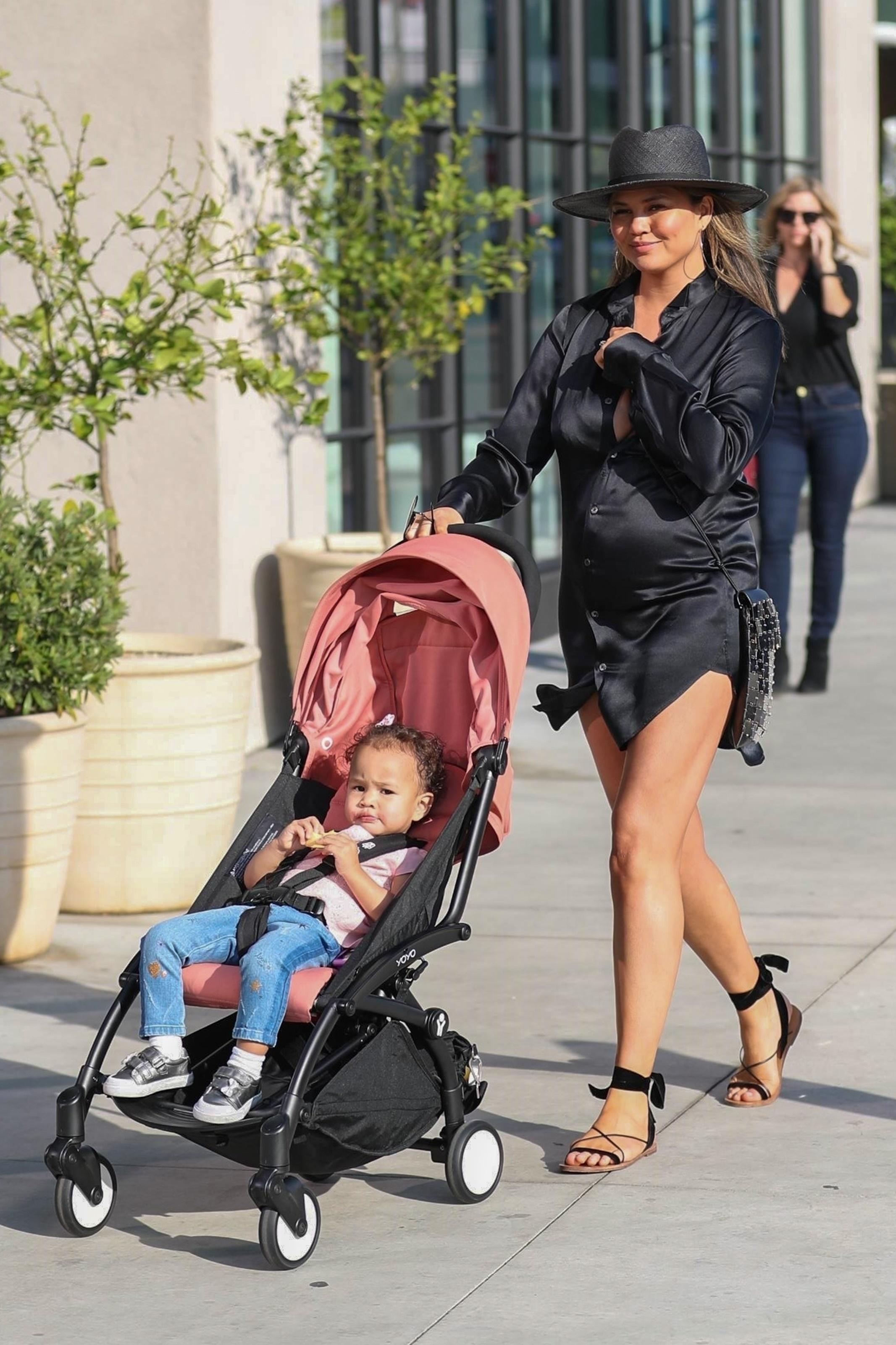 Chrissy Teigen takes her baby Luna shopping on Melrose Place