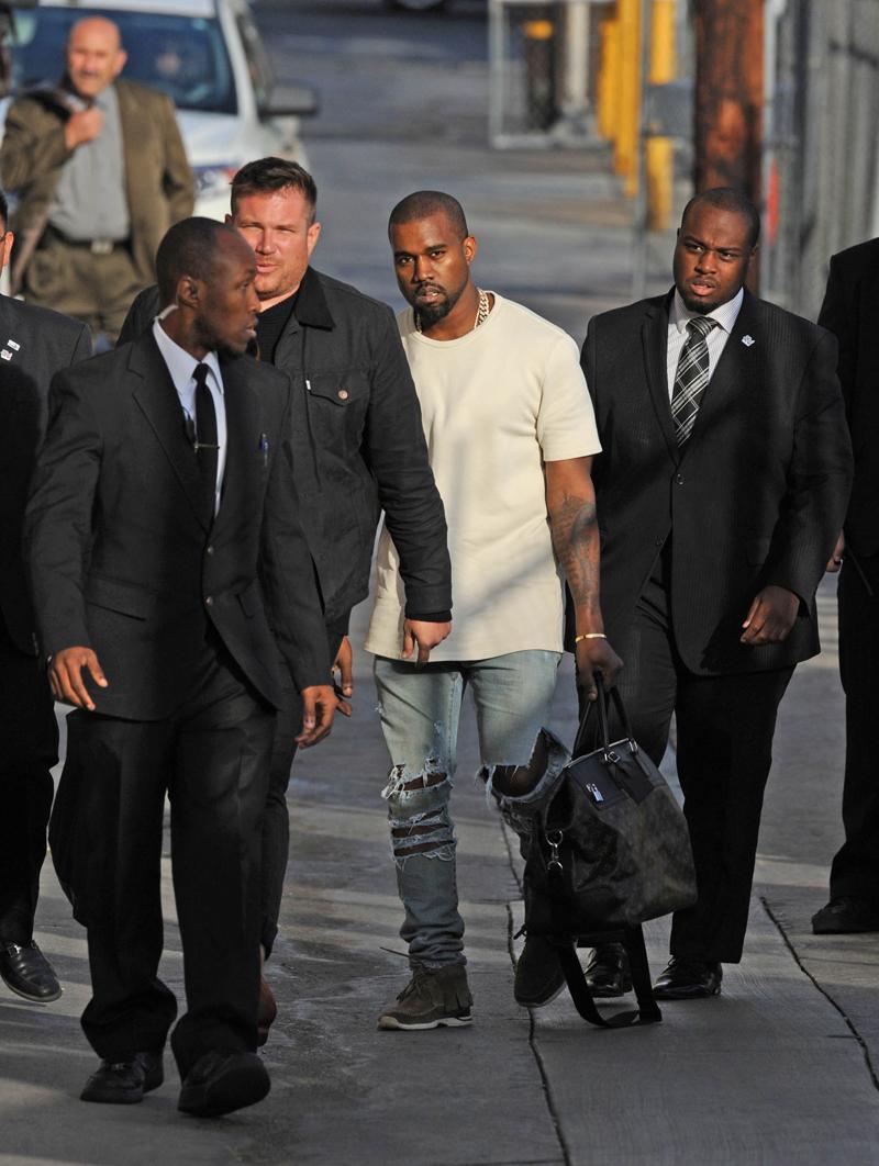 A stone faced Kanye West turns up to appear on &#8216;Jimmy Kimmel Live&#8217; after publicly feuding with the host! LA