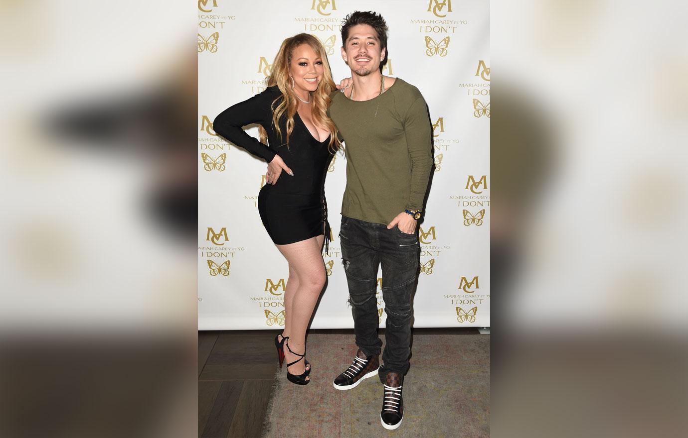 Mariah carey pays the bill for boy toy bryan tanaka  03