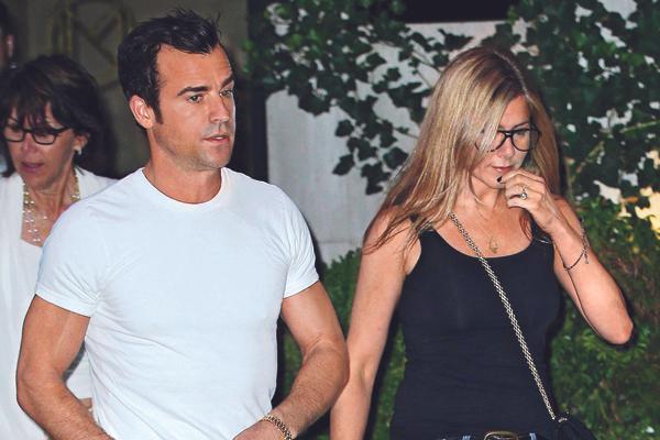 Jennifer Aniston and Justin Theroux go out with their mothers Nancy Dow and Phyllis Grissim Theroux in NYC