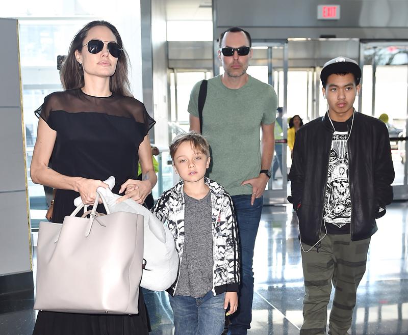 Angelina Jolie with sons Maddox, Knox and brother James Haven arrive at JFK airport in NYC