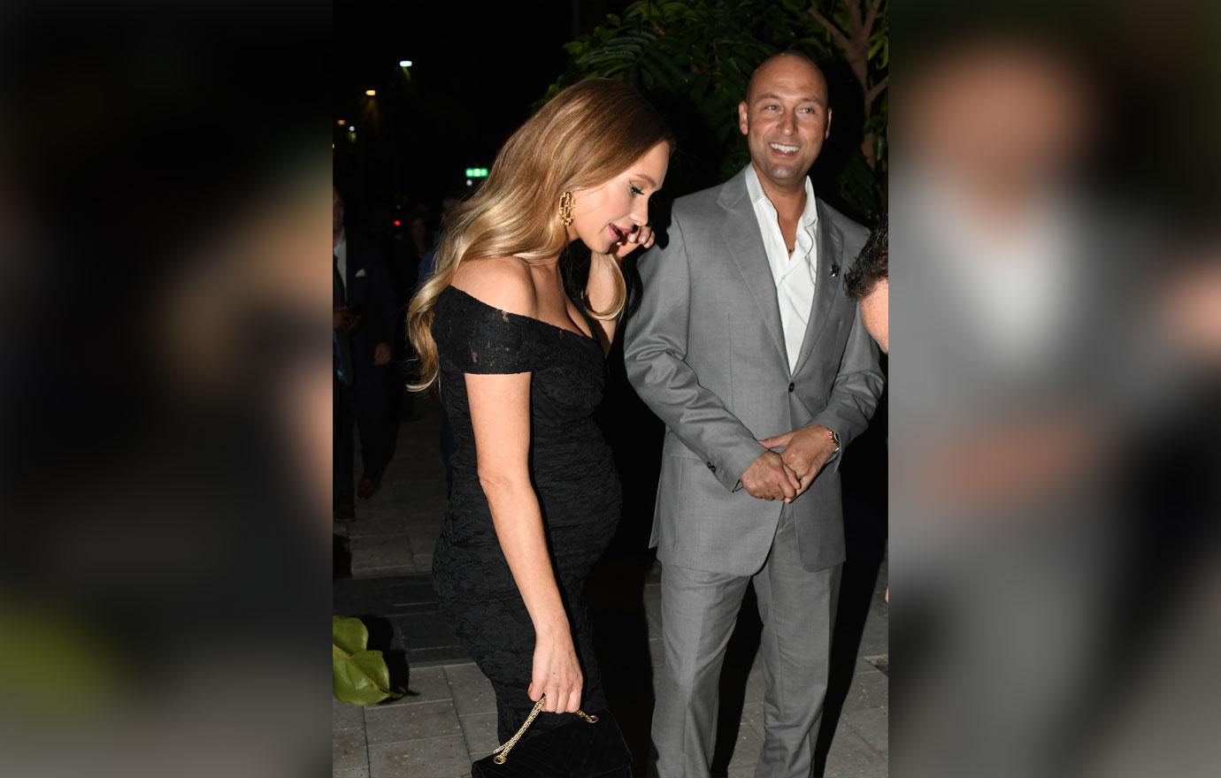 EXCLUSIVE: Pregnant Hannah Jeter shows of her baby bump in a black lace dress as she arrives to Bar Bevy with husband Derek in Miami