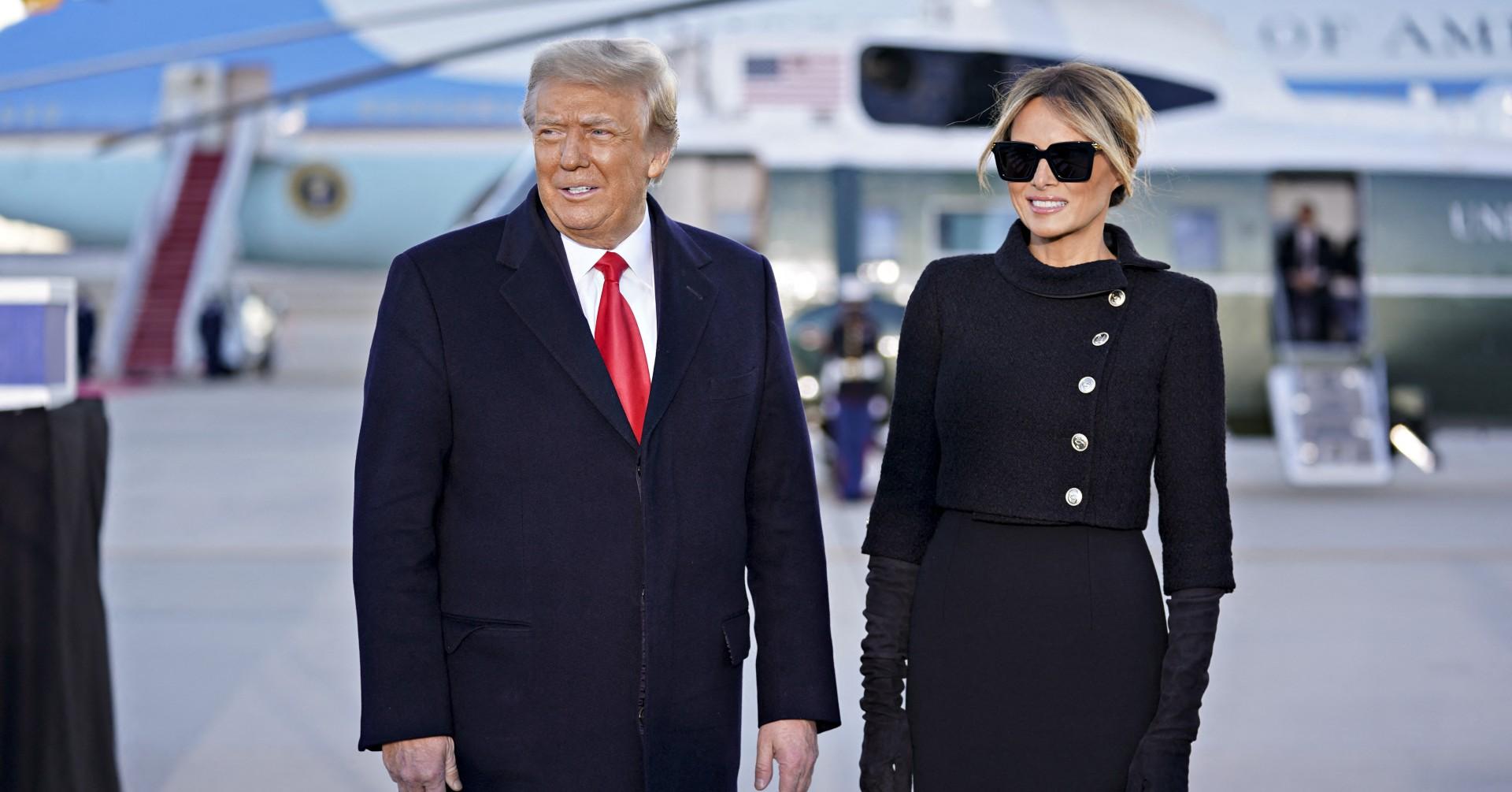 flying solo donald trump boards plane to michigan without wife melania