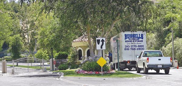 Moving trucks pulled up to Kendra and Hank’s L.A. home shortly after news of his cheating broke on June 26. © 2014 FameFlynet_ Inc _ Beverly Hills_ CA_ U.S.A.