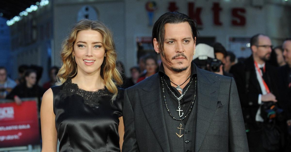 amber heard slams johnny depp team