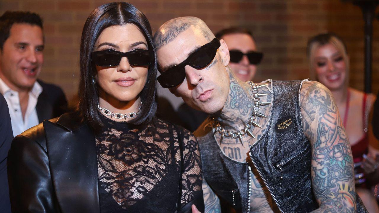 Image of Kourtney Kardashian and Travis Barker step out for Landon’s birthday party.
