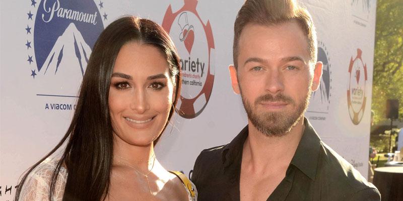 Nikki Bella and beau Artem Chigvintsev spotted out after her ex John Cena  appeared with mystery gal