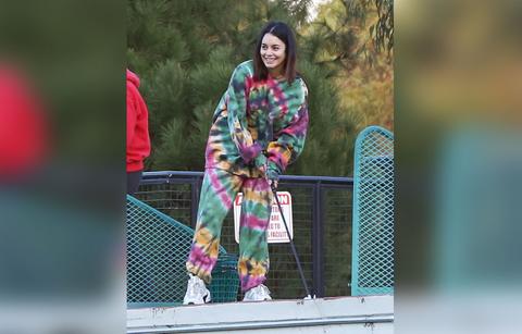 vanessa hudgens and her boyfriend cole tucker hit the driving range on new years eve