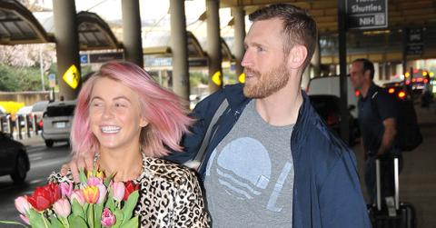 EXCLUSIVE: Julianne Hough is all smiles as boyfriend Brooks Laich picks her up at the airport in Washington, DC