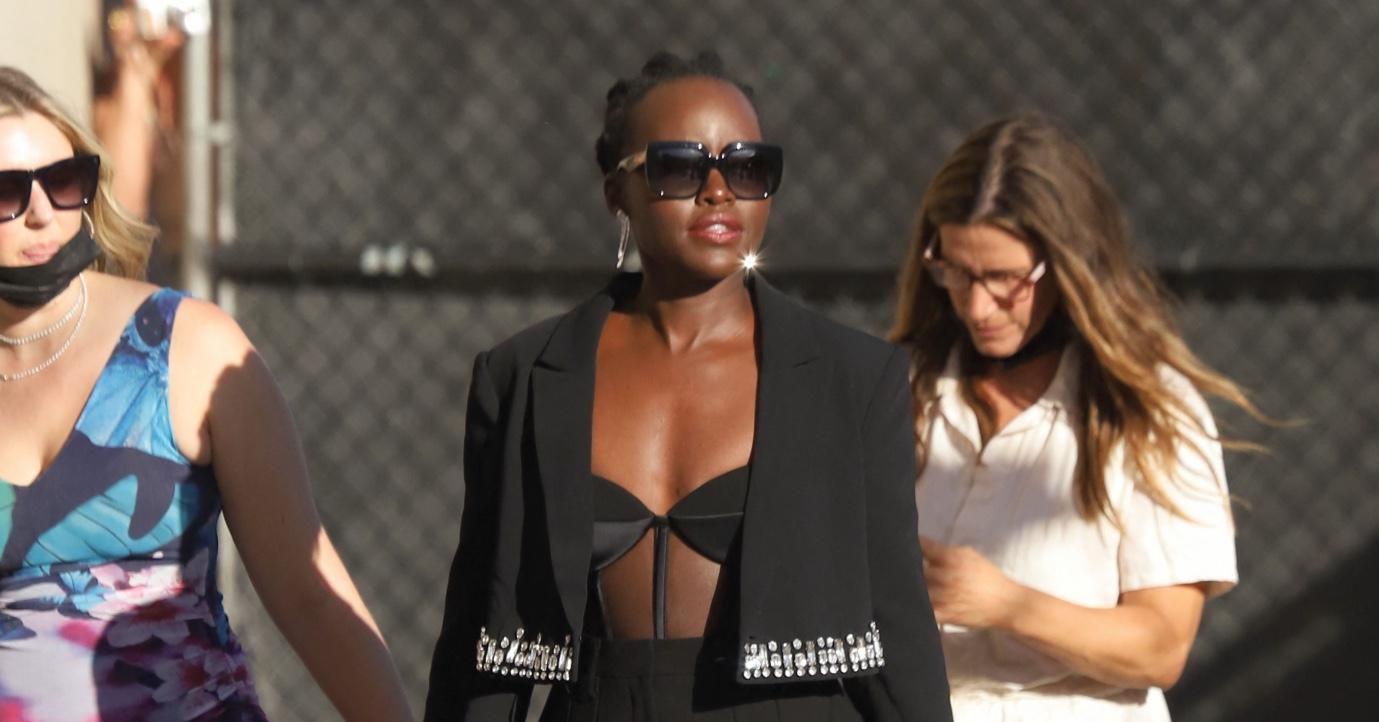 Lupita Nyong'o flaunts her summer body in a variety of bikinis while  showing off her dance moves