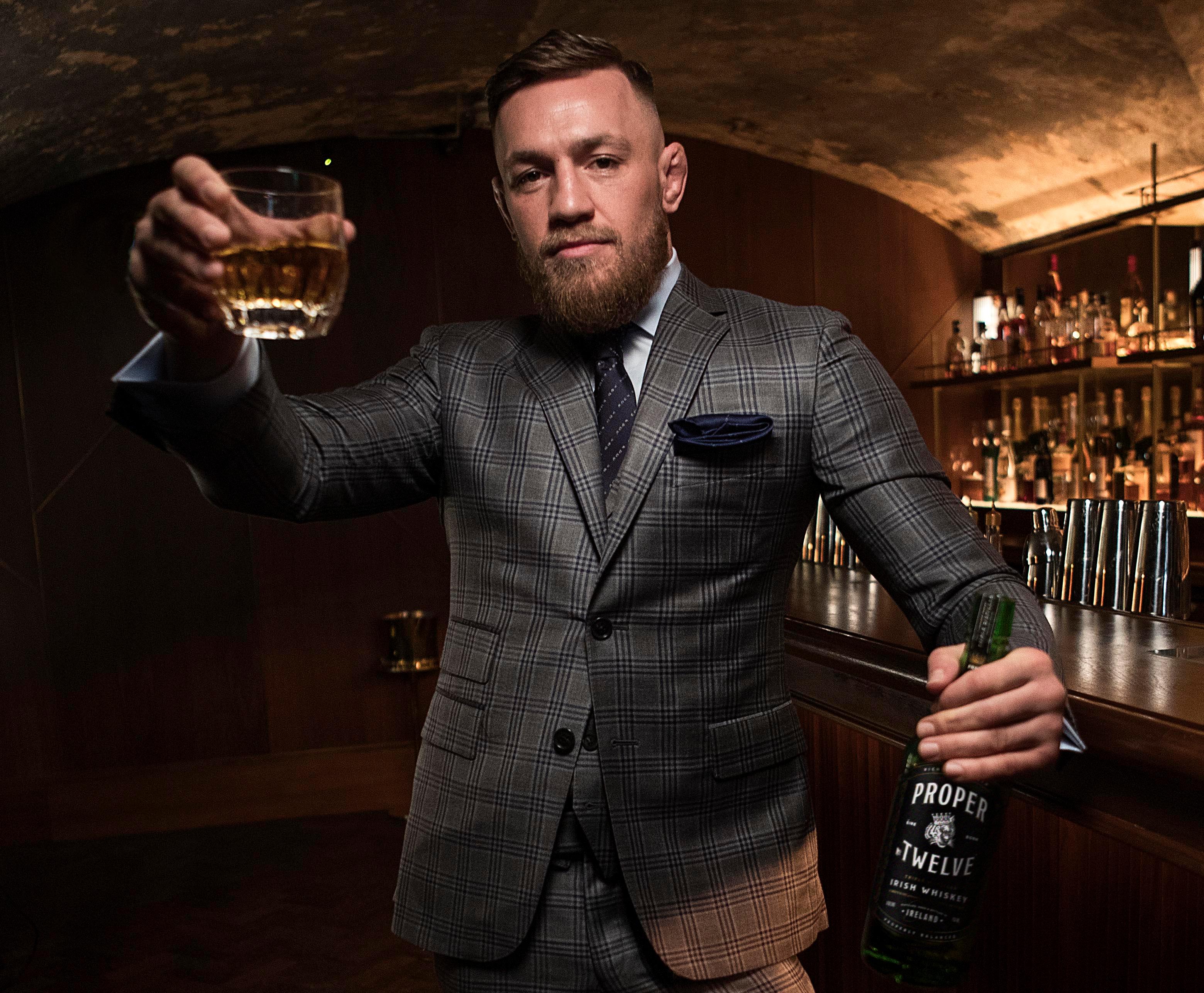 conor mcgregor with bottle