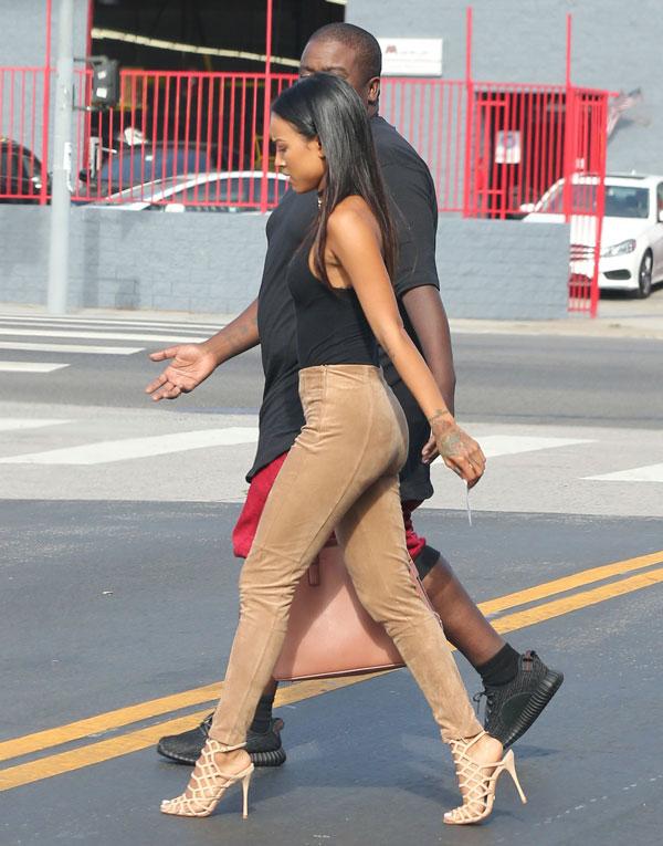 Karrueche Tran steps out in suede trousers following selfie death threats