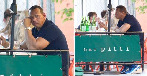 alex rodriguez looks sad as he eats alone in bar pitti