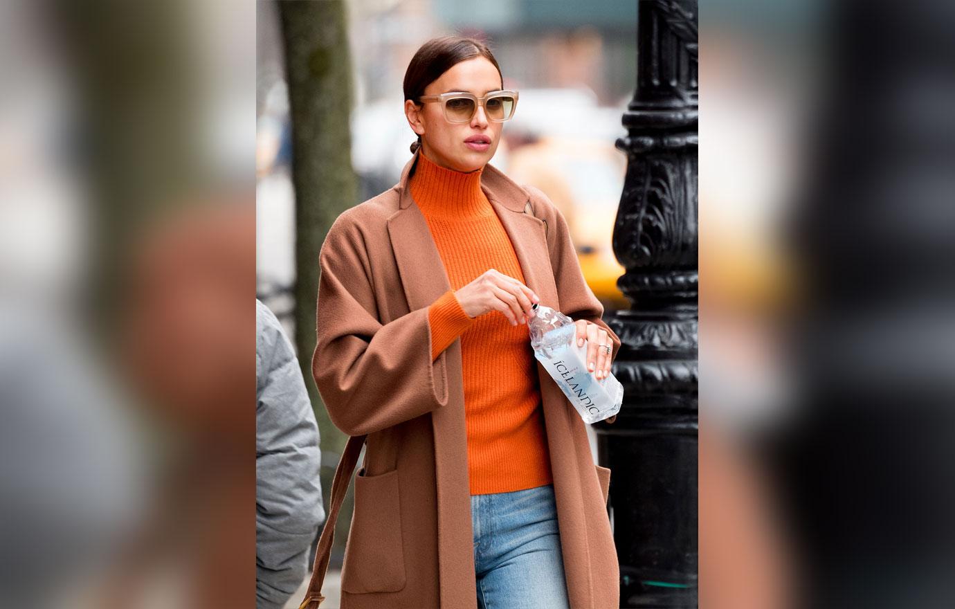 **EXCLUSIVE**  Photo Credit: MOVI Inc.  Date: February 26th 2018FOR GLOBAL SALES CALL (U.S) 310 739 4693 OR EMAIL contact@movi inc.comChic Hydration! Model Irina Shayk looks super chic and keeps hydrated with a bottle of Icelandic Glacial water as she t