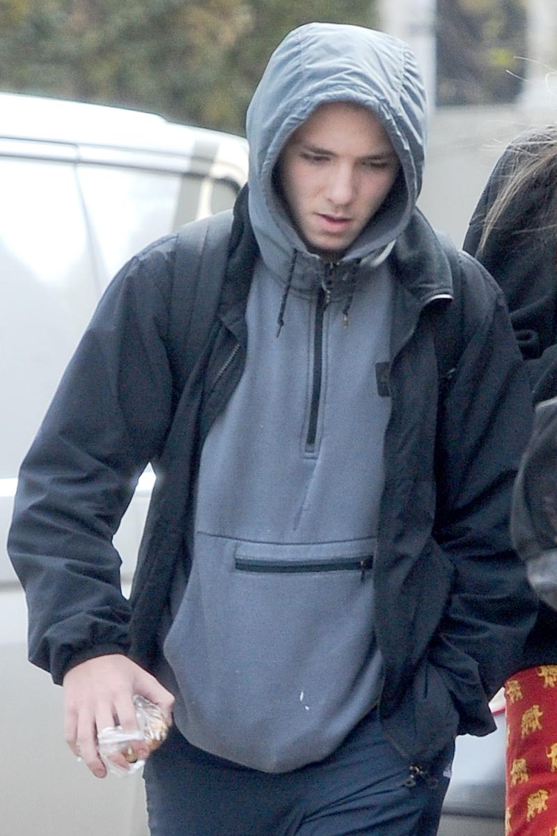 *EXCLUSIVE* Rocco Ritchie steps out walking around London with friends