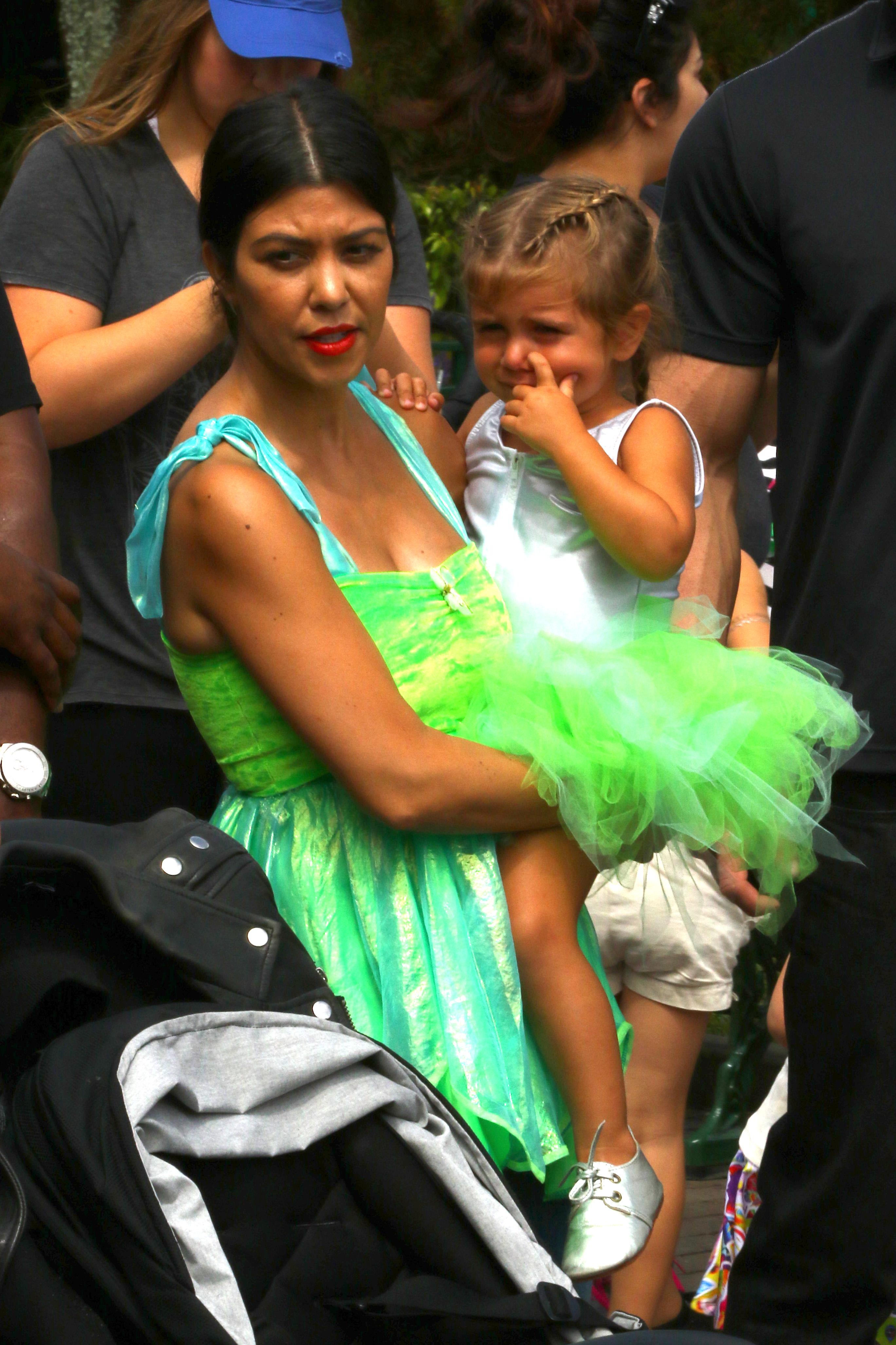 Kourtney Kardashian comforts a sad Penelope at Disneyland without dad Scott Disick around