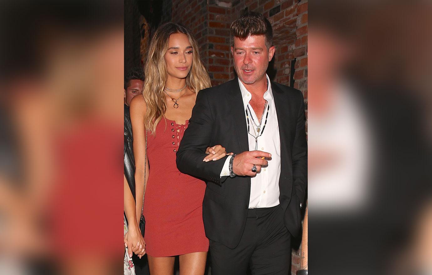 Robin Thicke and April Love leave a night out at TAO