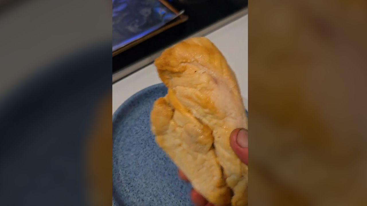 Image of Fraser Morse turned the chicken over to compare its unusual texture with the underside of the meat.