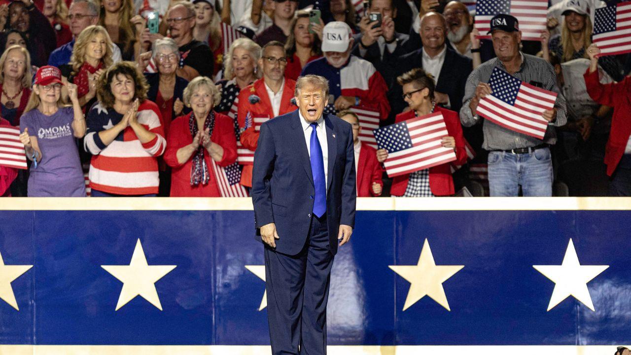 Image of Vendors sold MAGA hats, gold guitars, rubber ducks and other Donald Trump-branded items.