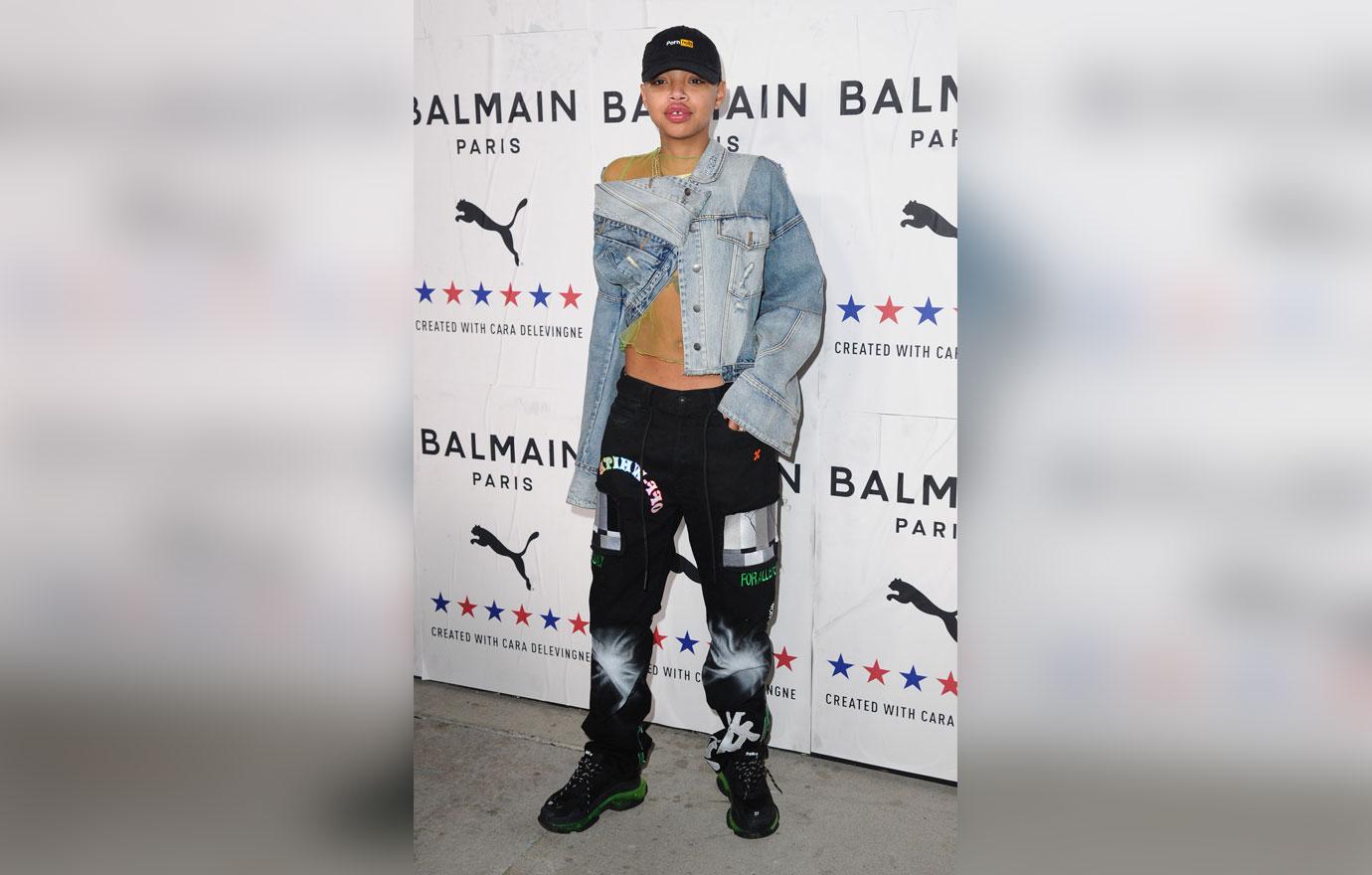 Slick Woods Wearing Denim Jacket