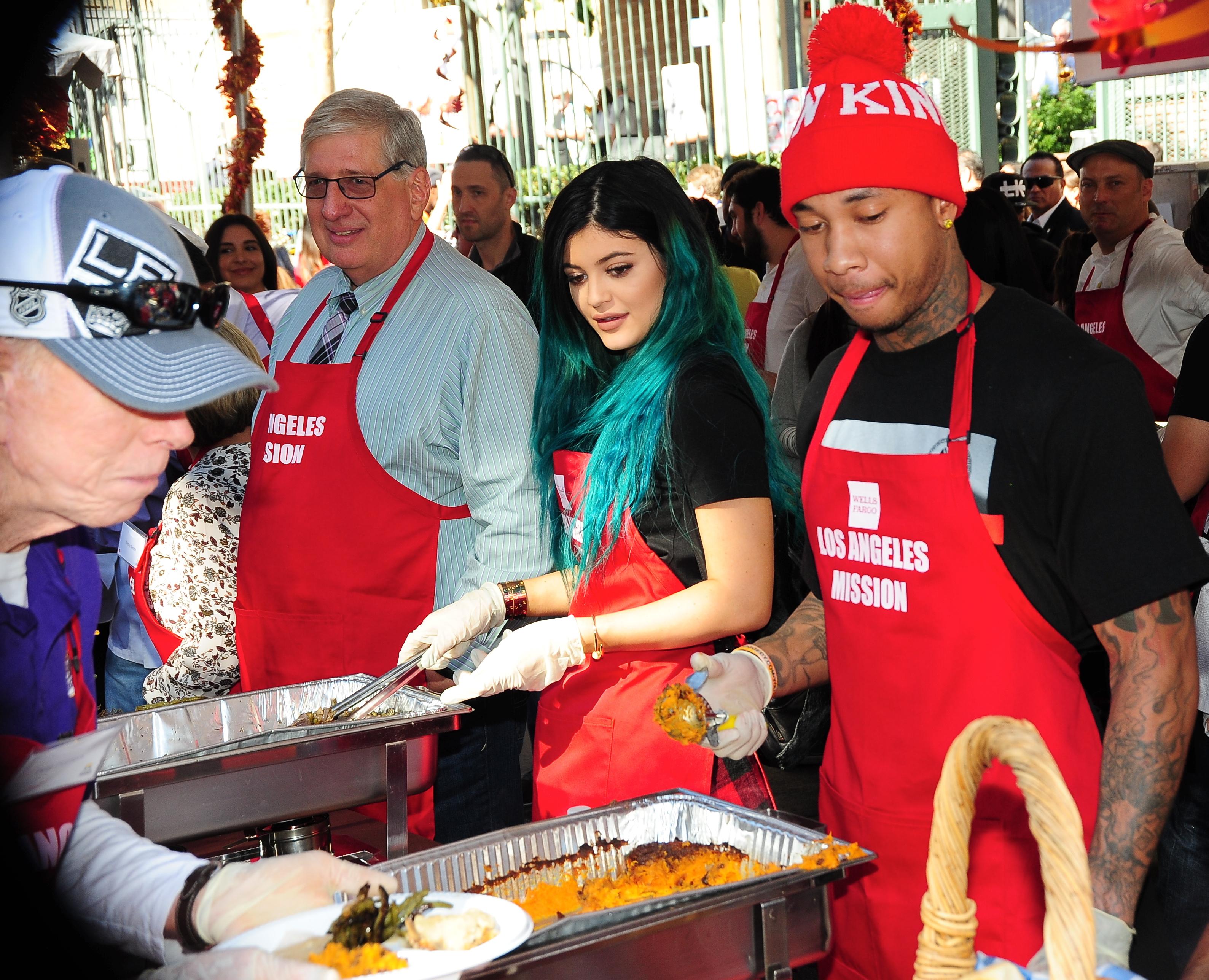 Kylie Jenner joins reported boyfriend, rapper Tyga, as they serve up Thanksgiving dinner to the homeless at the Los Angeles Mission in downtown Los Angeles, CA