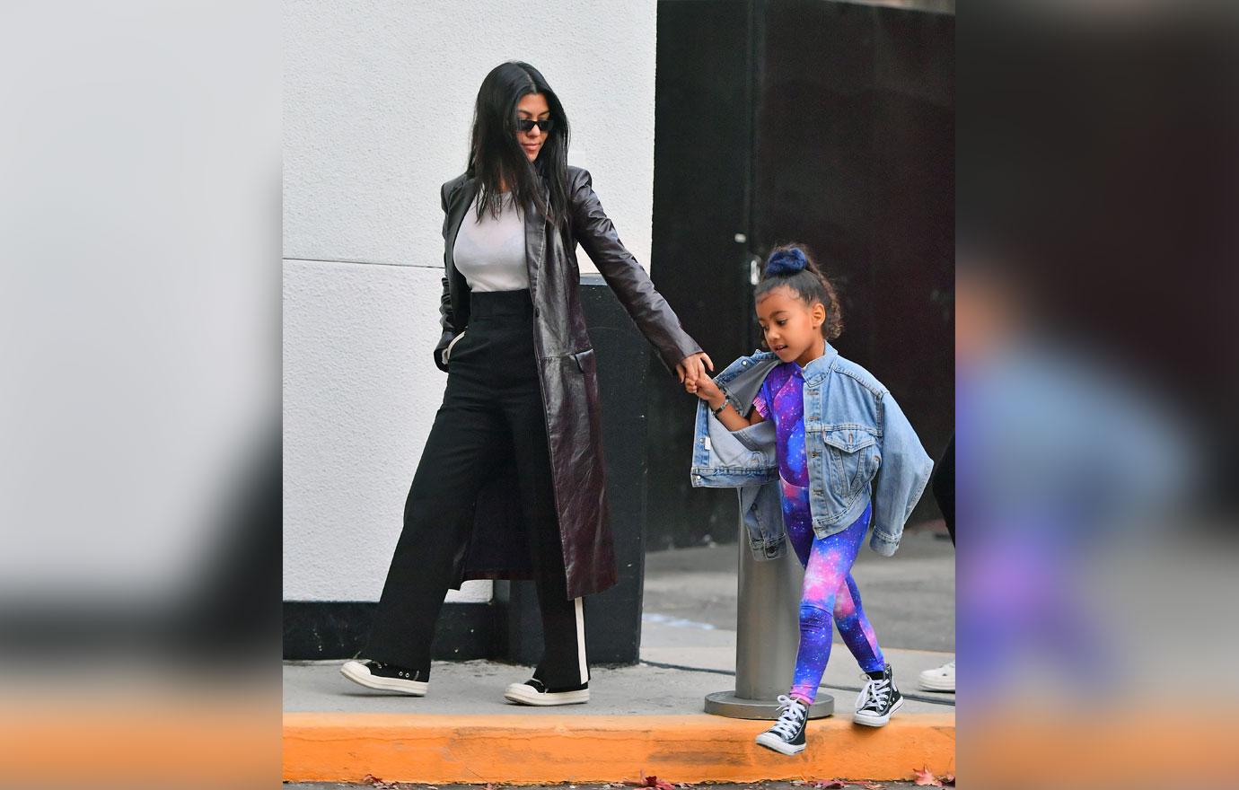 ** PREMIUM EXCLUSIVE RATES APPLY** Kourtney Kardashian and Scott Disick set their differences aside for a fun day at Universal Studios with their kids