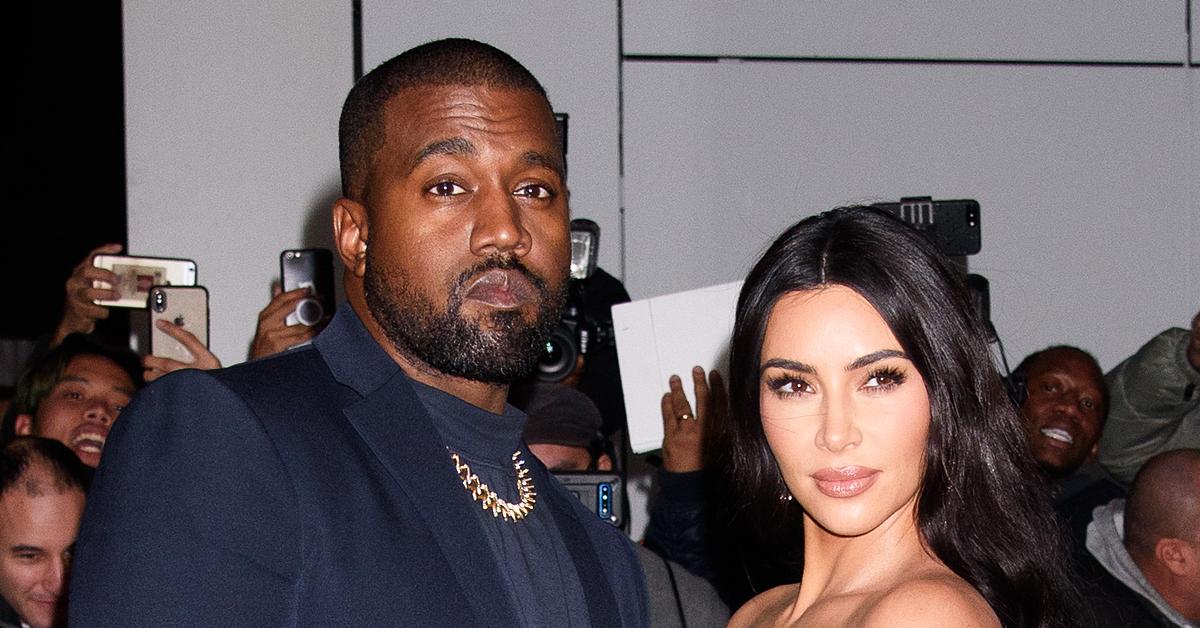 kanye west and a wedding dress clad kim kardashian leave donda listening party holding hands