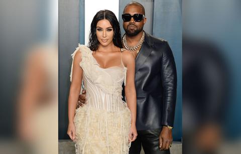 kanye west and a wedding dress clad kim kardashian leave donda listening party holding hands