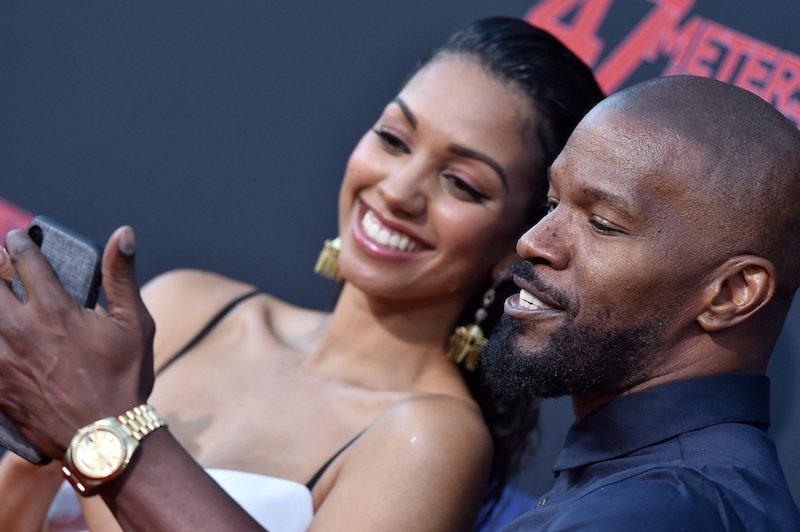 jamie foxx taking picture corinne daughter health