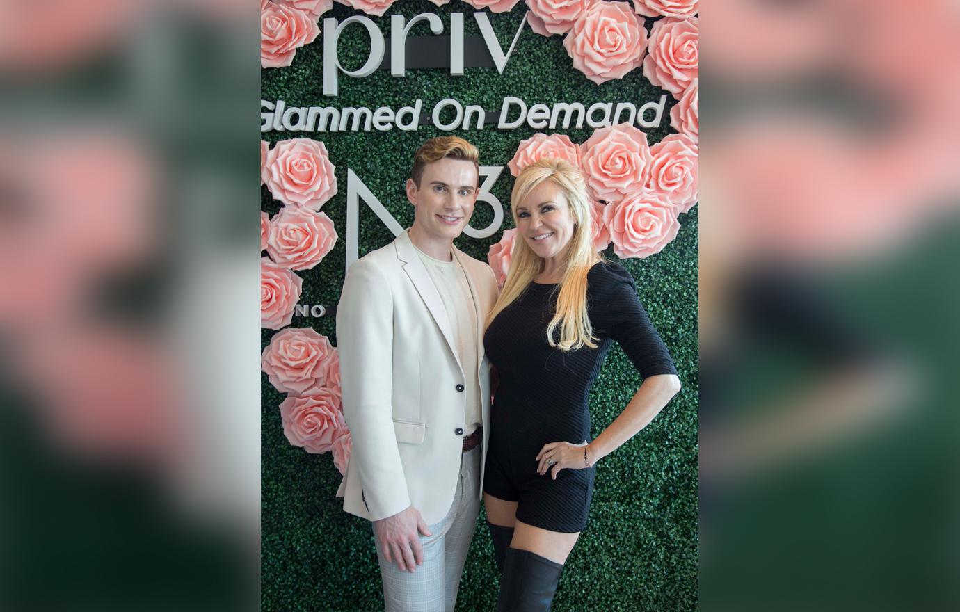 James Bradicich Bridget Masrquardt Posing Smiling In Front of Rose Backdrop