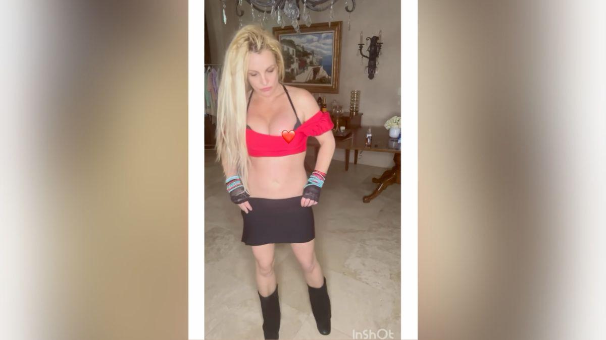 Photo of Britney Spears covered up a nip slip with a heart emoji.