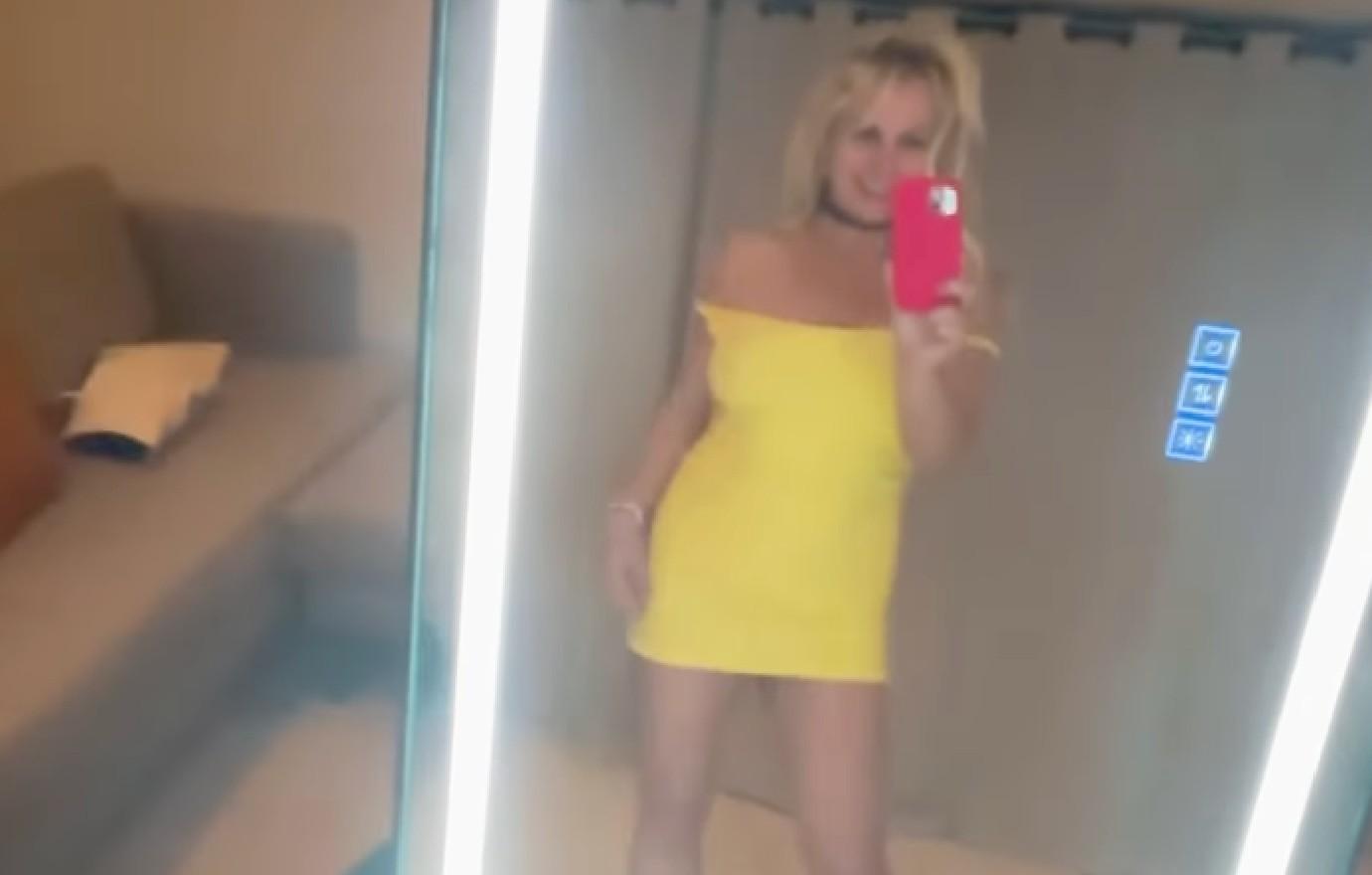 britney spears stuns models risque ensembles dressing room watch