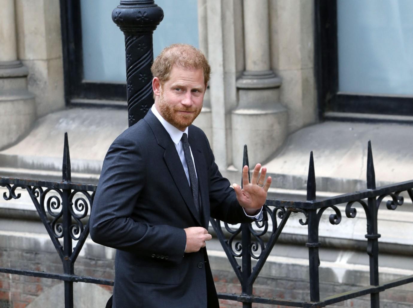 prince harry lawsuit prince william received payoff publisher phone hacking