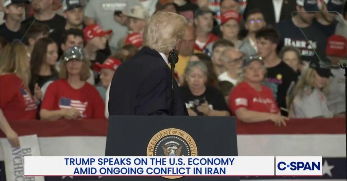 image of Dr. Mehmet Oz helped a woman during a Trump rally.