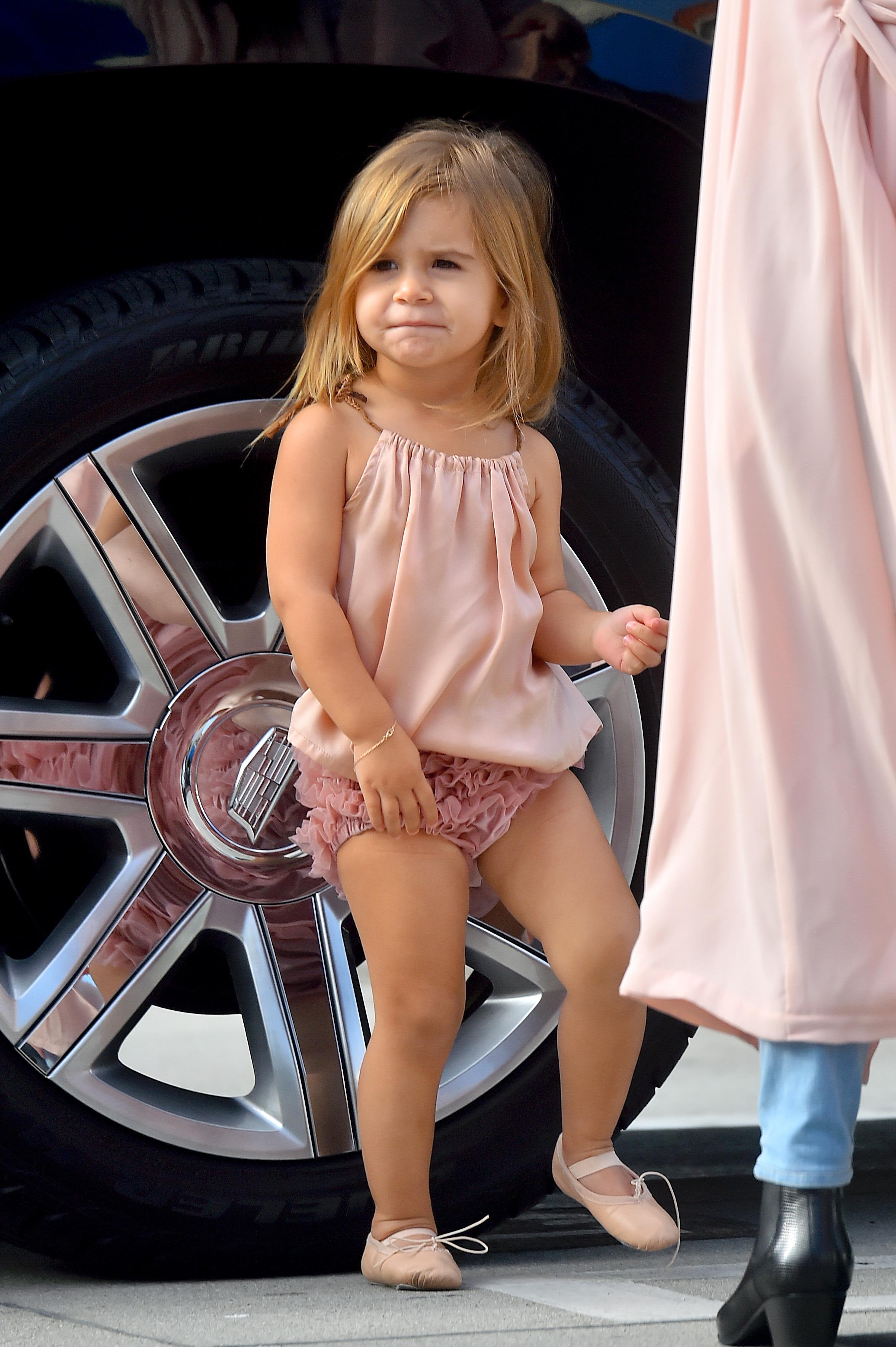 Kim Kardashian and Kourtney Kardashian take their daughters to a dance class in woodland hills