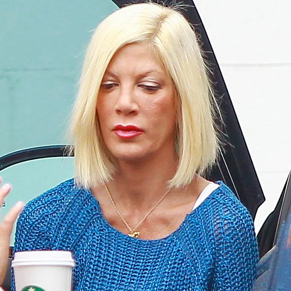 Tori Spelling shows offa  deep tan and a very slim figure as she takes her daughter Stella to dance class, while reality cameras roll ****NO DAILY MAIL SALES***